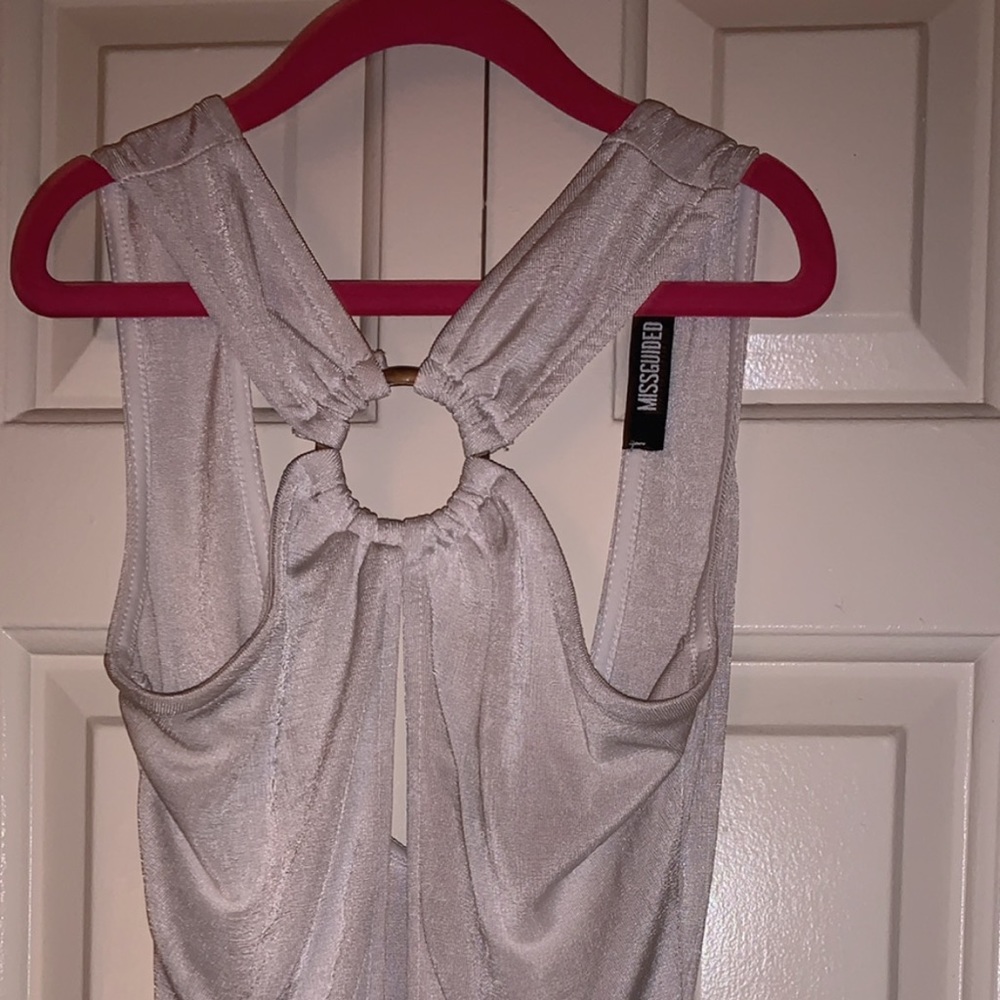 White shimmering body suit